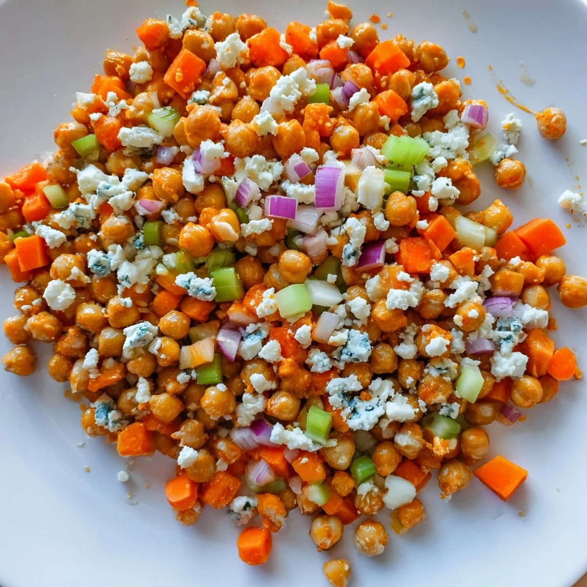 This flavorful Buffalo Chicken Bean Salad is served, showcasing the bright colors and textures.