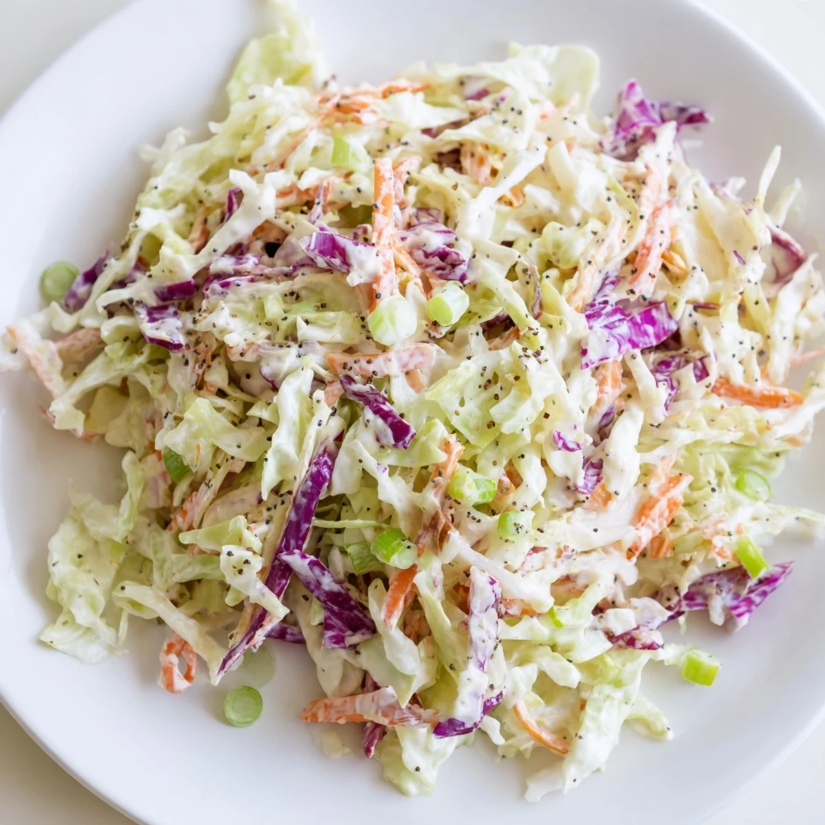 Cool and creamy Quick Coleslaw Salad with Creamy Dressing, perfect for summer barbecues or as a sandwich topping.