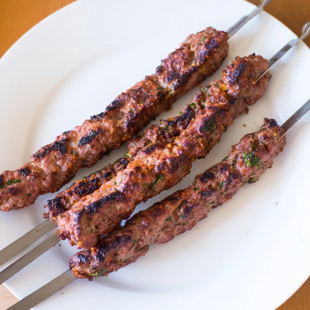 Vibrant image of Iraqi Kebab Tikka: sizzling kebabs on skewers, offering a tantalizing smoky aroma and taste.