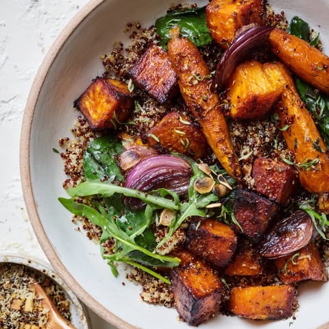 Golden roasted root vegetables in a flavorful Herb Bowl, enhanced with fresh herbs of thyme and tarragon.