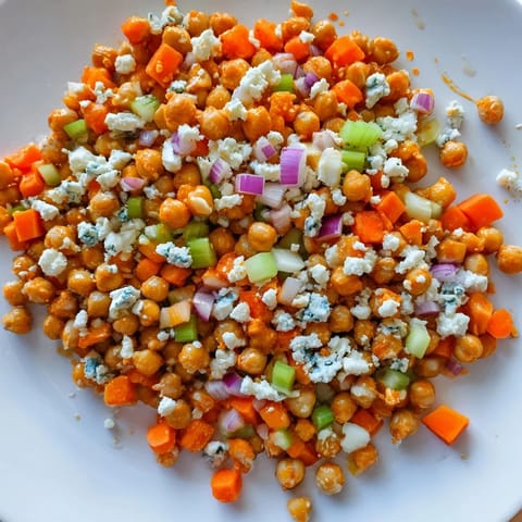 This flavorful Buffalo Chicken Bean Salad is served, showcasing the bright colors and textures.
