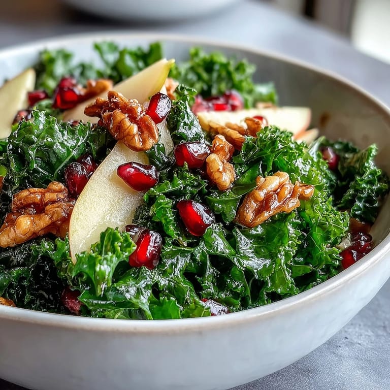 Tender massaged kale and bright pomegranate arils tossed in a tangy apple cider vinaigrette. 